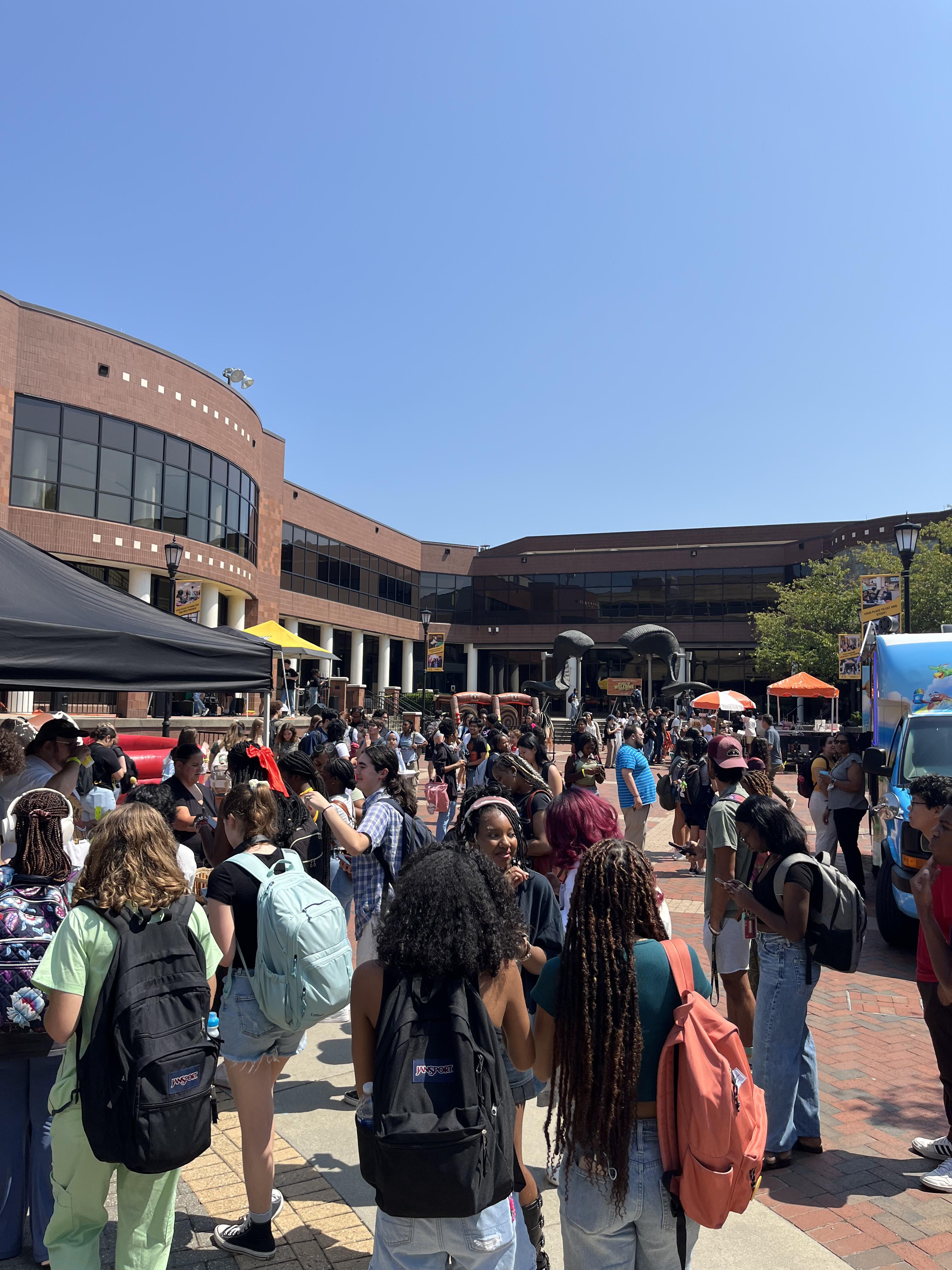 Students at Weeks of Welcome 2024 Outside Plaza Rams Horns