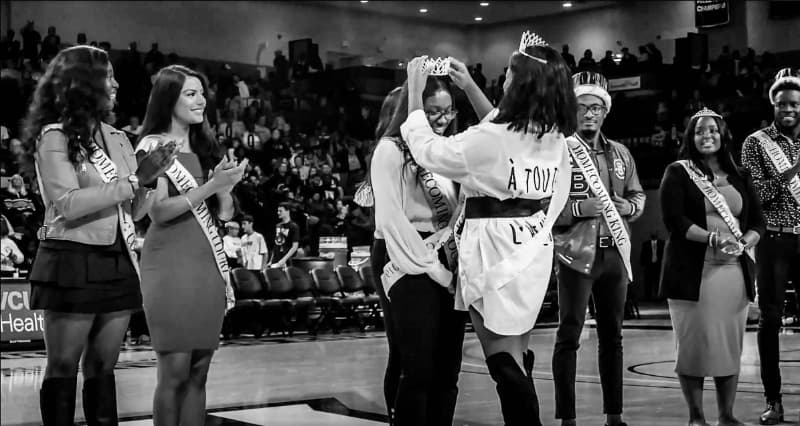 Homecoming queen being crowned on basketball court